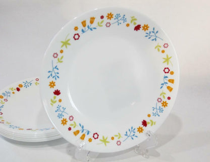Corelle Ditsy Flora dinnerware set stacked showing chip-resistant Vitrelle glass plates