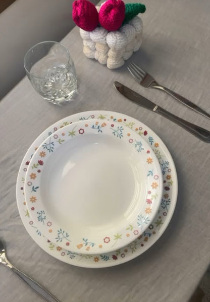 Corelle Ditsy Flora 18-piece crockery set arranged for 6-person dining table setup